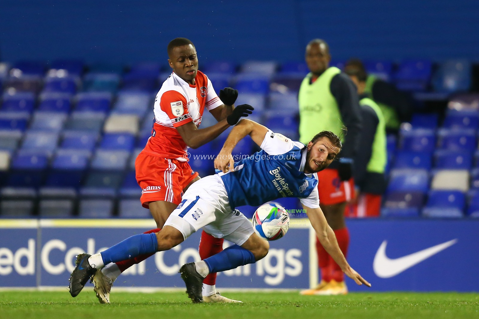 Ivan Sunjic (34) of Birmingham City is fouled by Anthony Stewart (5) of Wycombe Wanderers