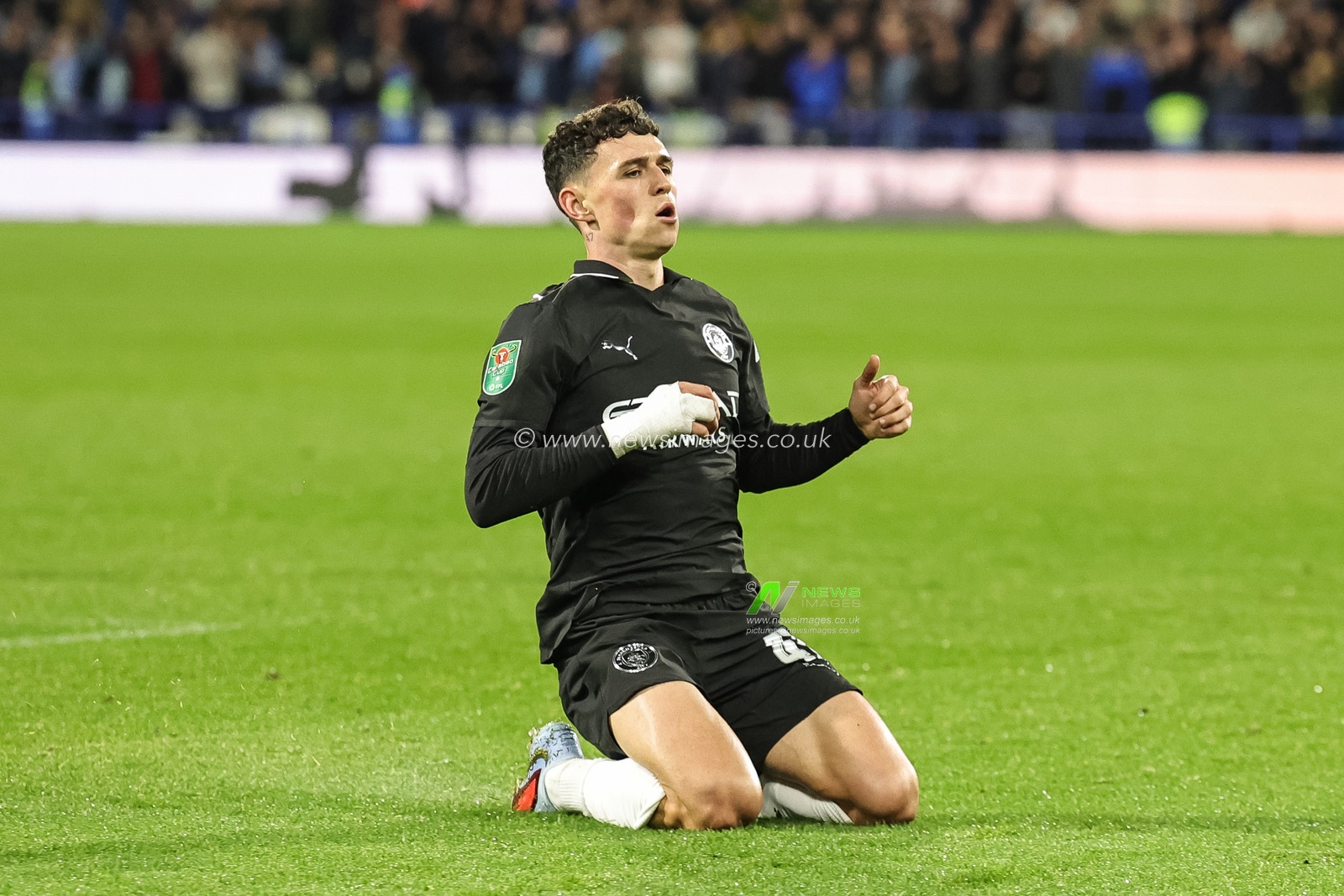 Phil Foden of Manchester City celebrates his goal to make it 0-1 during the Carabao Cup Round 3 match Huddersfield Town vs Manchester City at Accu Stadium, Huddersfield, United Kingdom, 24th September 2025

(Photo by Mark Cosgrove/News Images)