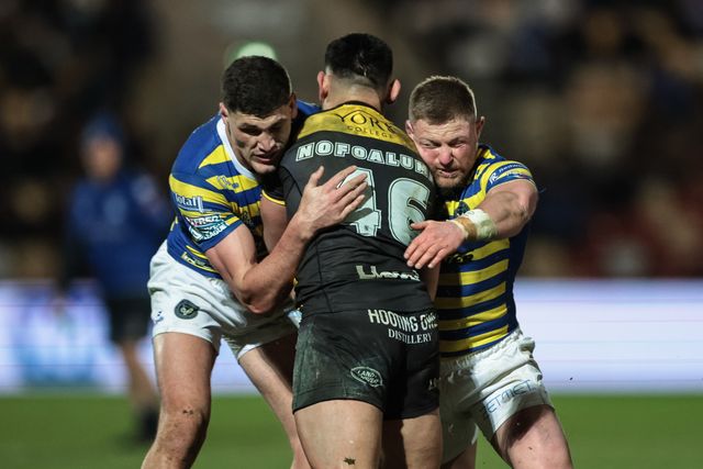 David Nofoaluma of York Knights is tackled by Sam Stone of Warrington Wolves and Luke Yates of Warrington Wolves during the Betfred Super League Round 4 match York Knights vs Warrington Wolves at LNER Community Stadium, York, United Kingdom on 06 March 2026

(Photo by Mark Cosgrove/News Images)