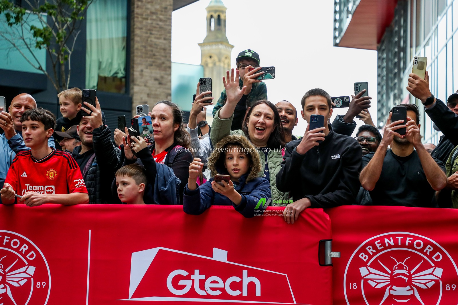 Fans wait for player arrivals prior to the Premier League match Brentford vs Manchester United at The Gtech Community Stadium, London, United Kingdom, 4th May 2025

(Photo by Izzy Poles/News Images)