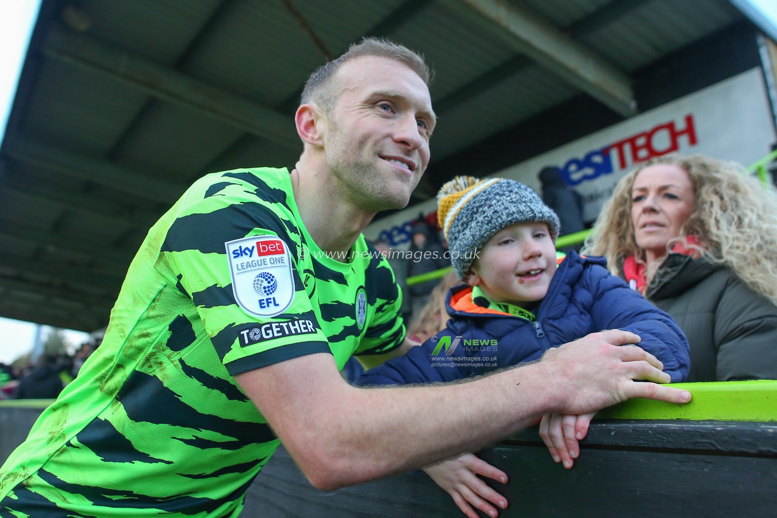 Dylan McGeouch #4 of Forest Green Rovers poses for photos with fans after the Sky Bet League 1 match Forest Green Rovers vs Cambridge United at The New Lawn, Nailsworth, United Kingdom, 3rd December 2022

(Photo by Gareth Evans/News Images)