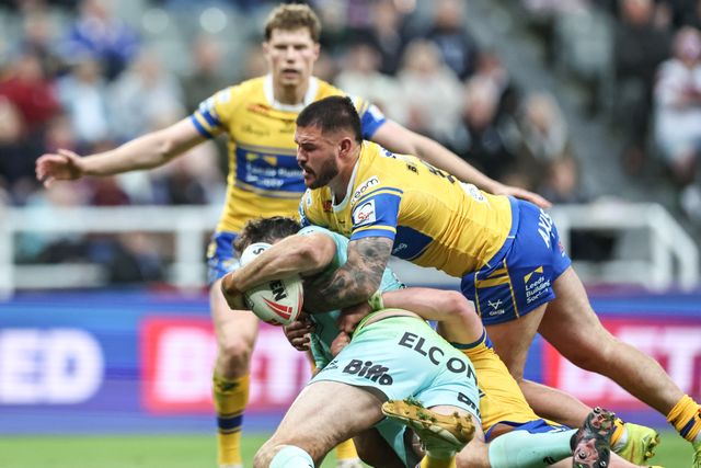 Alex Walmsley of St. Helens is tackled by James Bentley of Leeds Rhinos during the Betfred Magic Weekend 2025 match St Helens vs Leeds Rhinos at St. James's Park, Newcastle, United Kingdom, 3rd May 2025

(Photo by Mark Cosgrove/News Images)