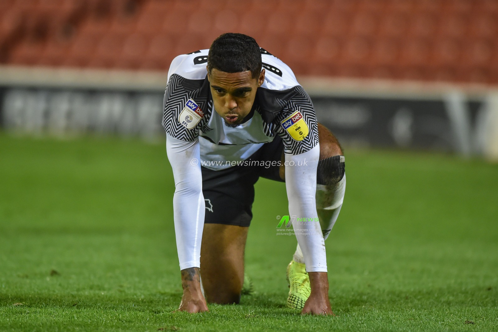2nd October 2019, Oakwell, Barnsley, England; Sky Bet Championship, Barnsley v Derby County :Max Lowe (25) of Derby County lays injured on the pitch

Credit: Dean Williams/News Images
