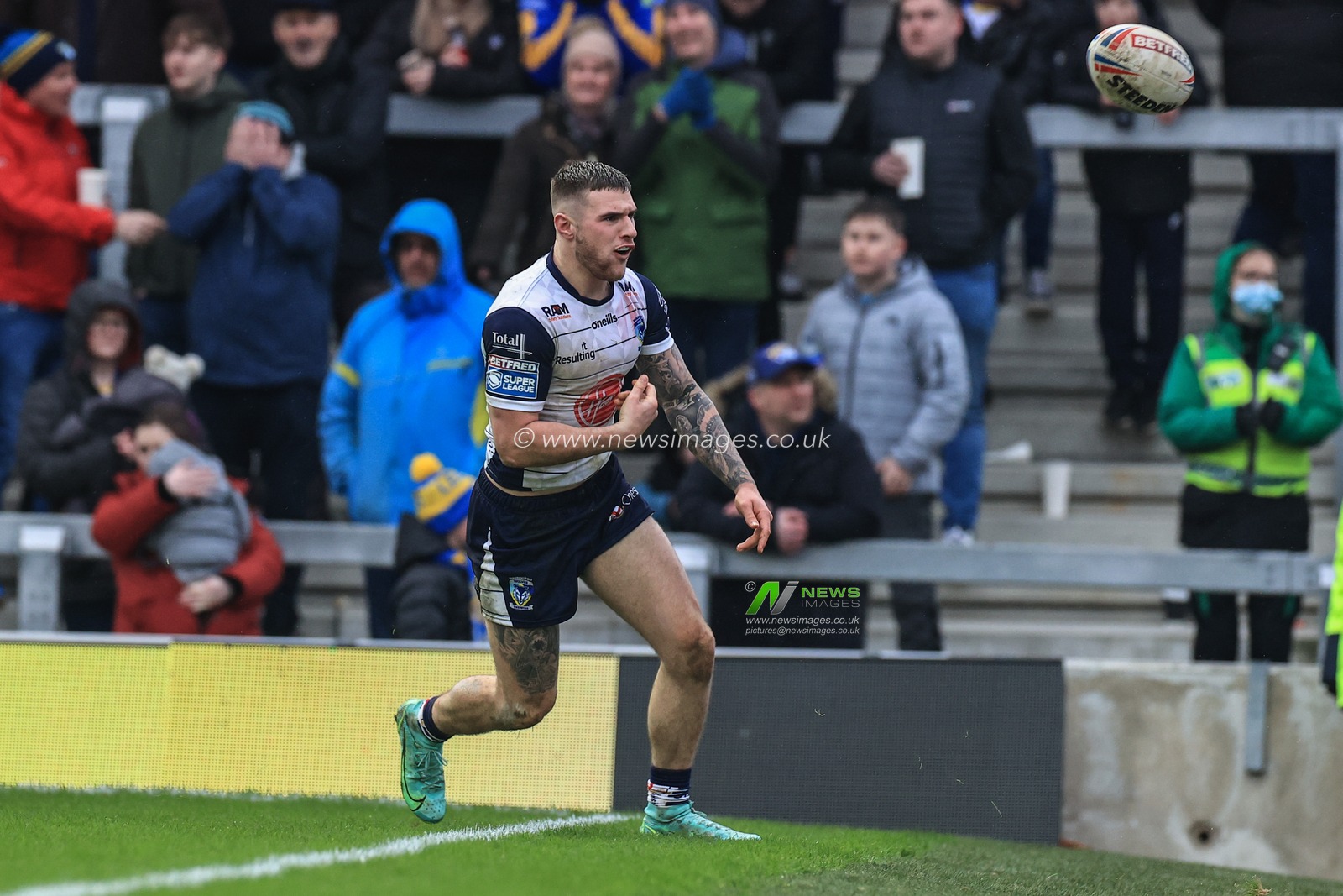 Connor Wrench #23 of Warrington Wolves celebrates his try