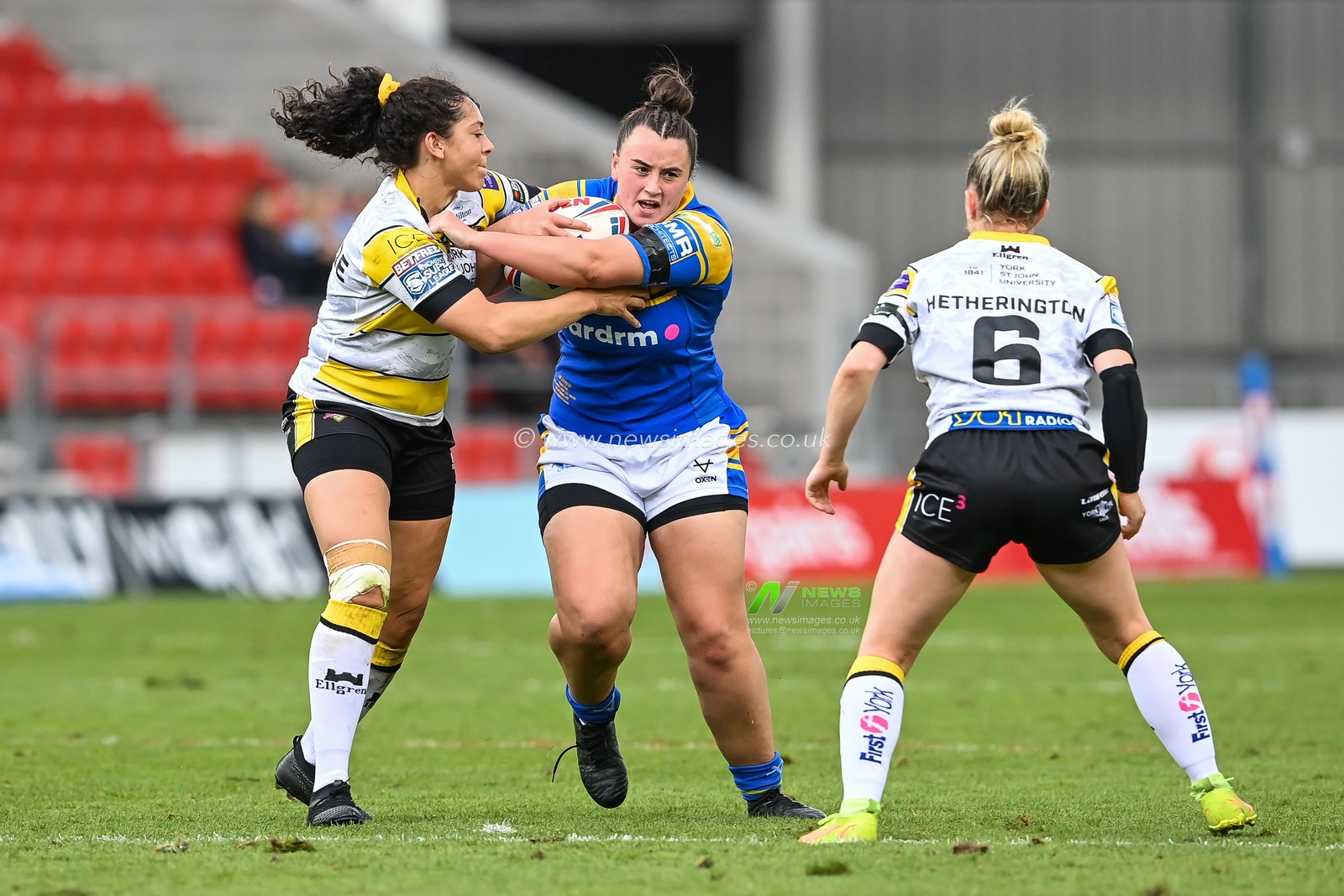 Shannon Lacey of Leeds Rhinos Women is tackled by Savannah Andrade of York City Knights Women during the Betfred Women's Super League Grand Final York CIty Knights Women vs Leeds Rhinos Women at Totally Wicked Stadium, St Helens, United Kingdom, 18th September 2022

(Photo by Craig Thomas/News Images)