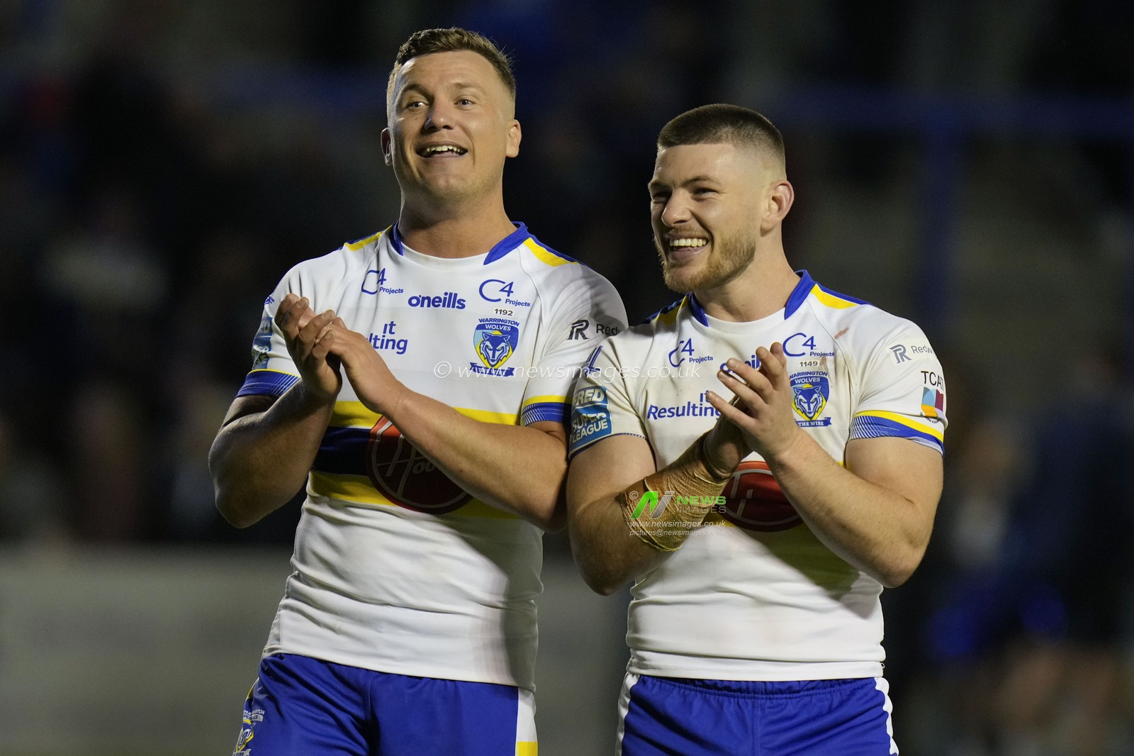 Josh Drinkwater #7 of Warrington Wolves and Danny Walker #16 of Warrington Wolves salutes the fans after the Betfred Super LeagueRound 12 match Warrington Wolves vs Hull KR at Halliwell Jones Stadium, Warrington, United Kingdom, 12th May 2023

(Photo by Steve Flynn/News Images)