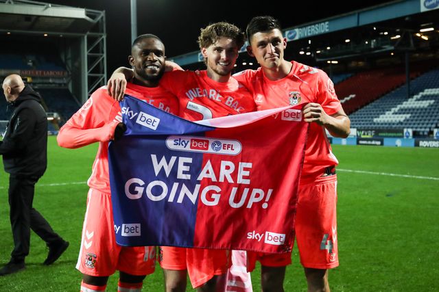 Frank Onyeka of Coventry City and Jack Rudoni of Coventry City and Bobby Thomas of Coventry City celebrates promotion back to the Premier League after the Sky Bet Championship match Blackburn Rovers vs Coventry City at Ewood Park, Blackburn, United Kingdom on 17 April 2026

(Photo by Jorge Horsted/News Images)