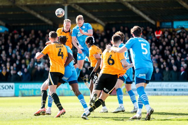 Michael Morrison of Cambridge United heads the ball during the Sky Bet League 1 match Cambridge United vs Peterborough United at Cledara Abbey Stadium, Cambridge, United Kingdom, 15th March 2025

(Photo by Izzy Poles/News Images)