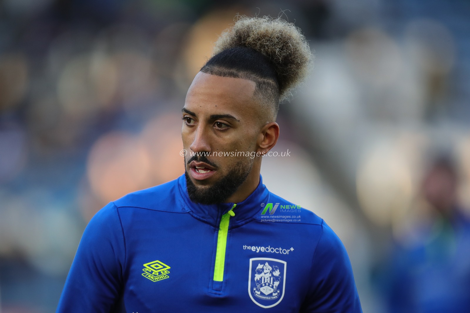 Sorba Thomas #14 of Huddersfield Town during the pre match warm up ahead of the Sky Bet Championship match Huddersfield Town vs Southampton at John Smith's Stadium, Huddersfield, United Kingdom, 25th November 2023

(Photo by James Heaton/News Images)