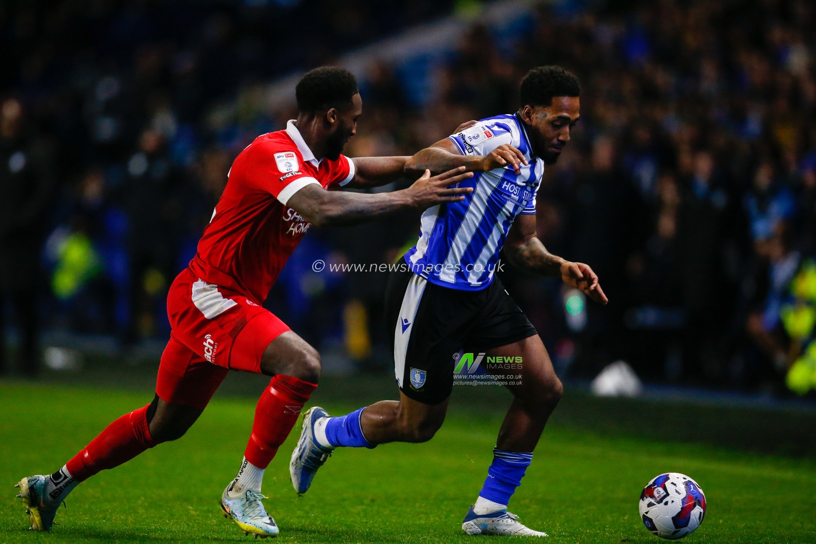 Mallik Wilks #7 of Sheffield Wednesday and Cheyenne Dunkley #22 of Shrewsbury Town during the Sky Bet League 1 match Sheffield Wednesday vs Shrewsbury Town at Hillsborough, Sheffield, United Kingdom, 19th November 2022

(Photo by Ben Early/News Images)