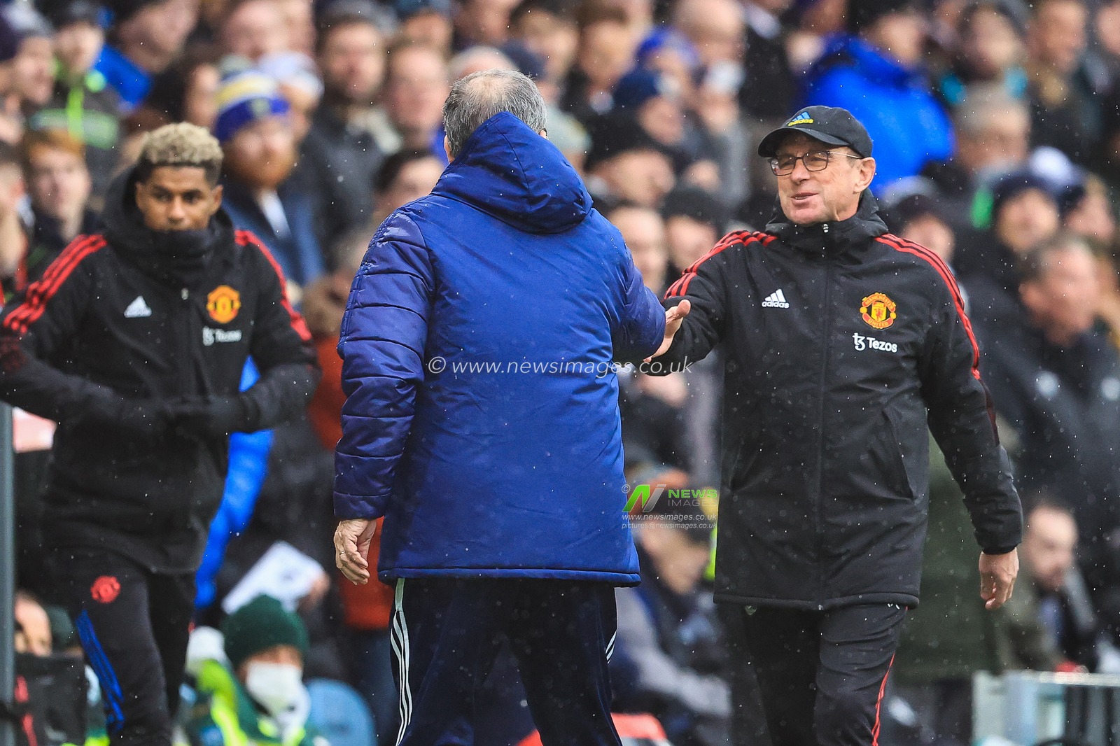 Ralf Rangnick manager of Manchester United and Marcelo Bielsa manager of Leeds United shake hands at the start of the game