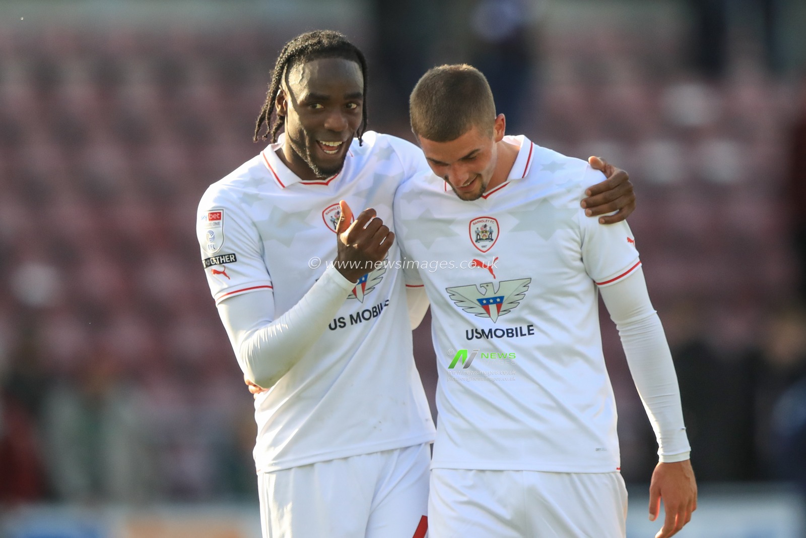 Devante Cole #44 of Barnsley embraces Max Watters #36 of Barnsley after Barnsley win 1-2 during the Sky Bet League 1 match Northampton Town vs Barnsley at Sixfields Stadium, Northampton, United Kingdom, 23rd September 2023

(Photo by Alfie Cosgrove/News Images)