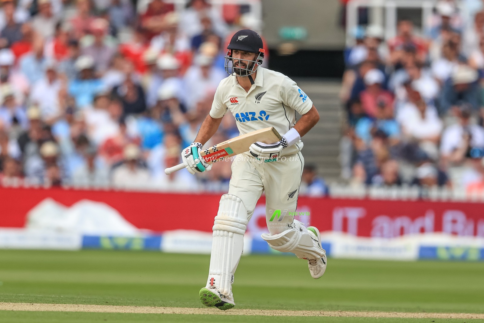 Daryl Mitchell of New Zealand makes one run