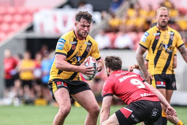 Bradley Singleton of Castleford Tigers is tackled during the Betfred Super League Round 18 match Salford Red Devils vs Castleford Tigers at Salford Community Stadium, Eccles, United Kingdom, 13th July 2025

(Photo by Alfie Cosgrove/News Images)