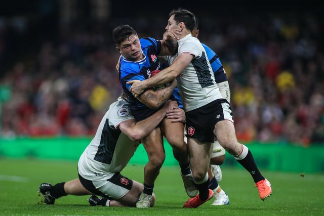 Charlie Lawrence of Japan is tackled by Tomos Williams of Wales during the Quilter Nations Series 2025 match Wales vs Japan at Principality Stadium, Cardiff, United Kingdom, 15th November 2025

(Photo by Andrew Lewis/News Images)

*** GER AUT SUI OUT ***