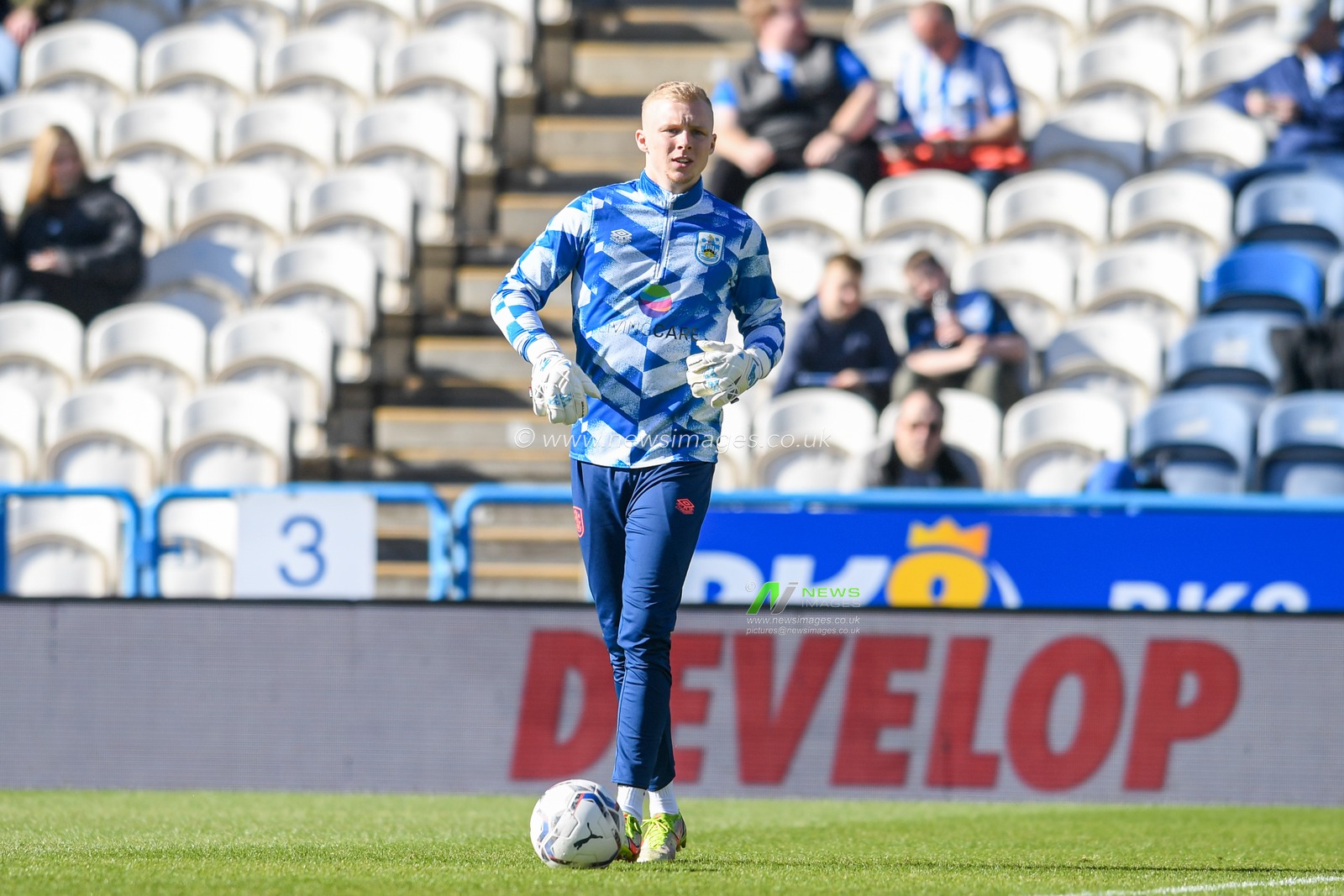 Jacob Chapman of Huddersfield Town warming up before the game