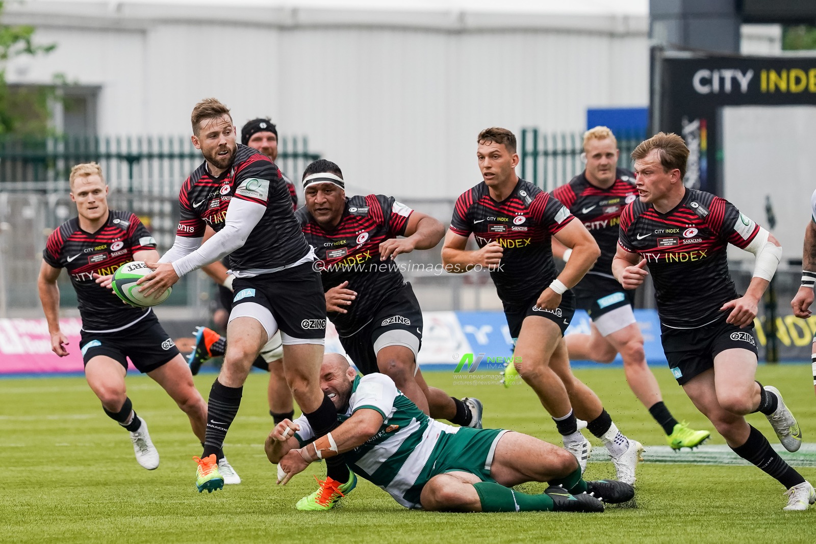 Elliot Daly #13 of Saracens in action