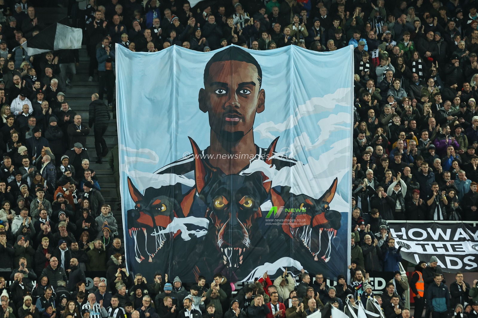 Alexander Isak of Newcastle United  on a flag ahead of the Premier League match Newcastle United vs West Ham United at St. James's Park, Newcastle, United Kingdom, 25th November 2024

(Photo by Mark Cosgrove/News Images)