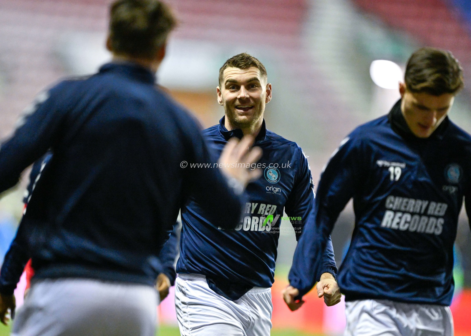 Sam Vokes of Wycombe Wanderers shares a joke during warms up ahead of the match, during the Sky Bet League 1 match Wigan Athletic vs Wycombe Wanderers at DW Stadium, Wigan, United Kingdom, 23rd January 2024

(Photo by Cody Froggatt/News Images)