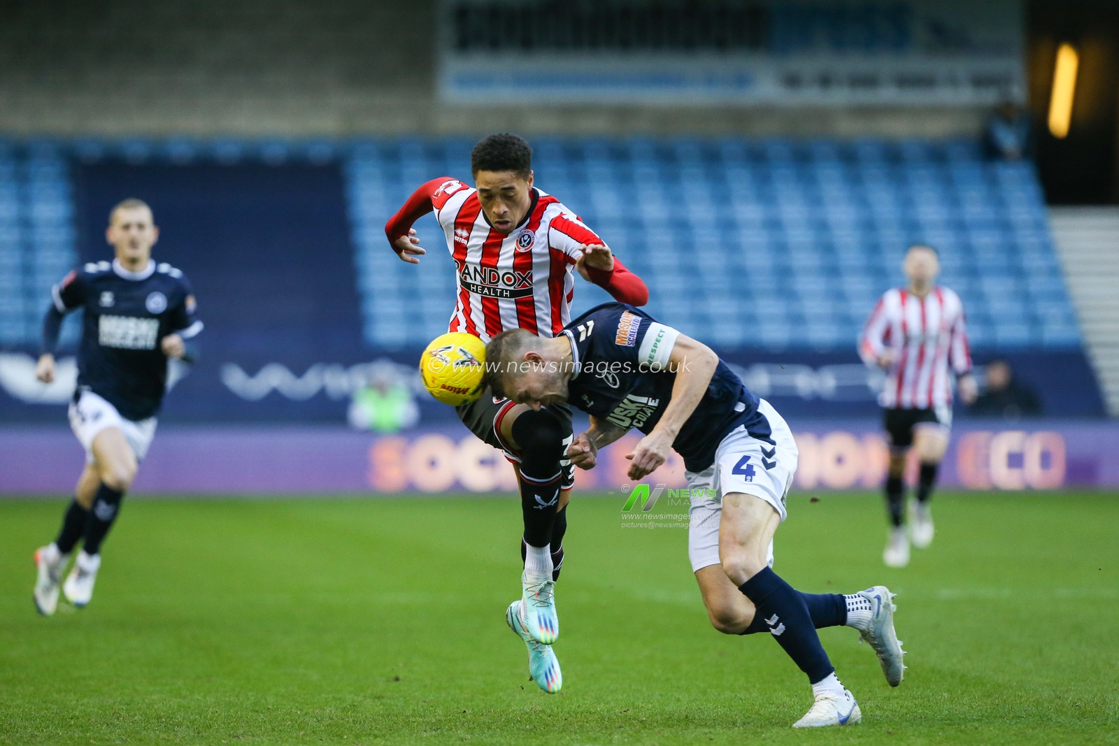 Shaun Hutchinson #4 of Millwall and Daniel Jebbison #36 of Sheffield United challenge for the ball during the Emirates FA Cup Third Round match Millwall vs Sheffield United at The Den, London, United Kingdom, 7th January 2023

(Photo by Arron Gent/News Images)
