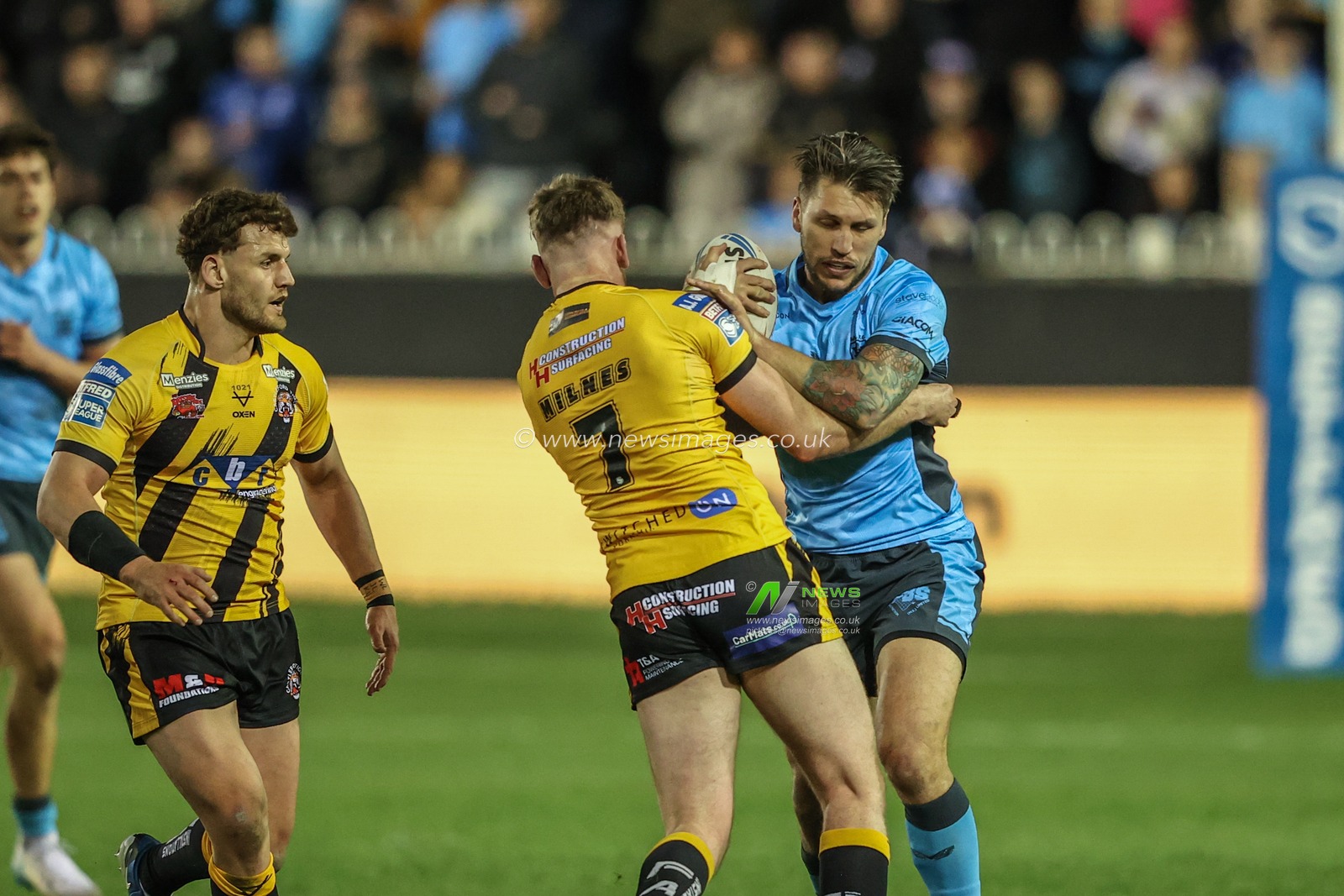 Tom Briscoe of Hull FC is tackled by Rowan Milnes of Castleford Tigers during the Betfred Super League Round 6 match Castleford Tigers vs Hull FC at The Mend-A-Hose Jungle, Castleford, United Kingdom, 27th March 2025

(Photo by Alfie Cosgrove/News Images)