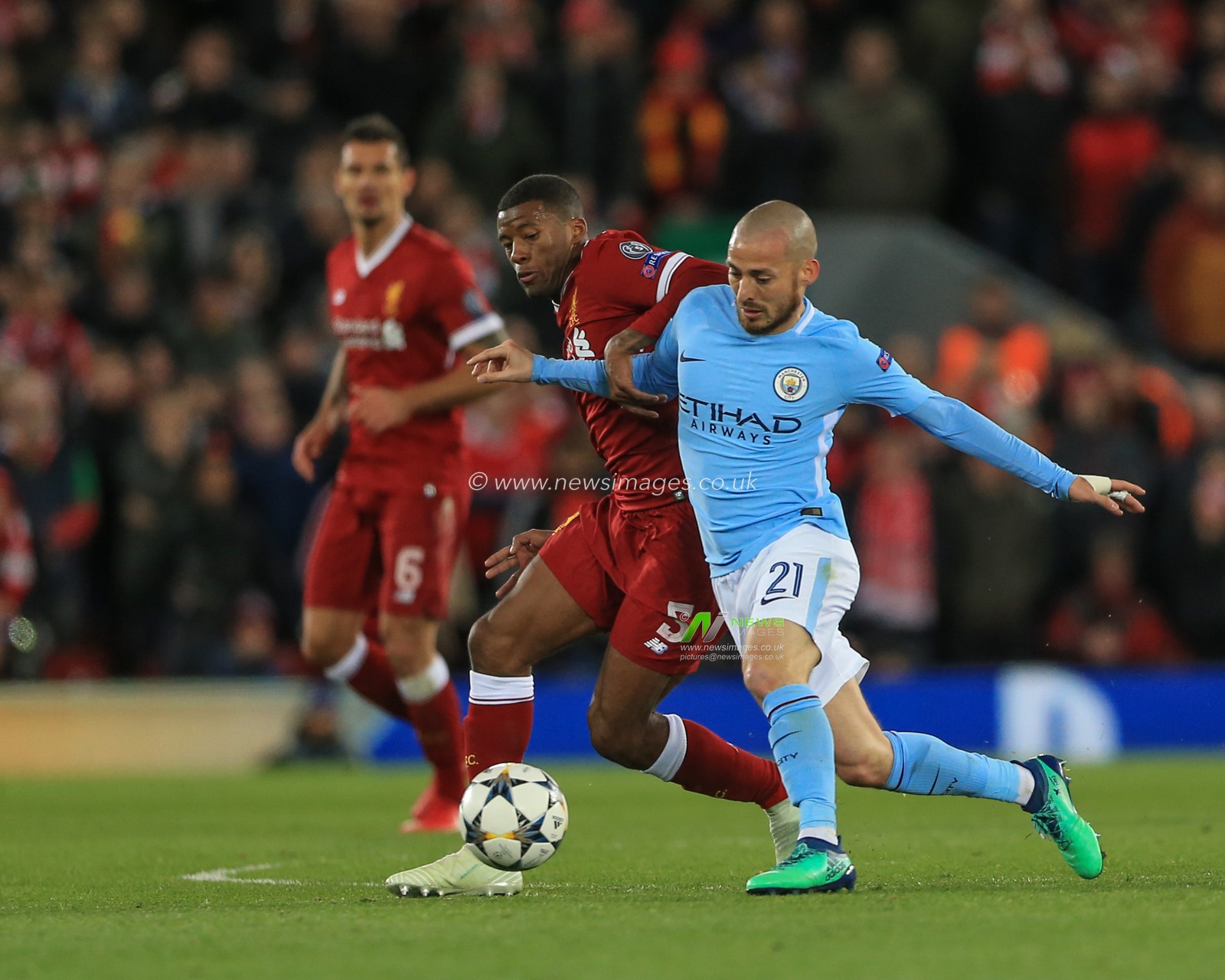 4th April 2018 , Anfield, Liverpool, England; Champions League Quarter Final, first leg, Liverpool v Manchester City;  Georginio Wijnaldum of Liverpool and David Silva of Manchester City battle for the ball