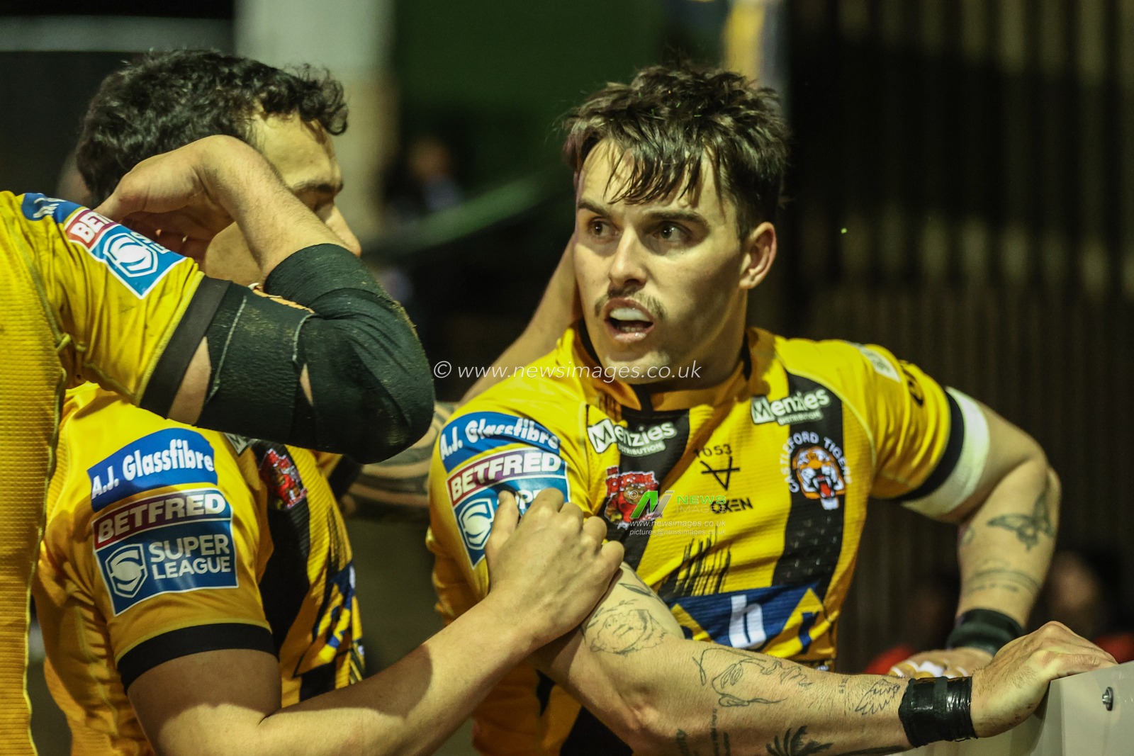 Tex Hoy of Castleford Tigers celebrates stopping a try during the Betfred Super League Round 6 match Castleford Tigers vs Hull FC at The Mend-A-Hose Jungle, Castleford, United Kingdom, 27th March 2025

(Photo by Alfie Cosgrove/News Images)