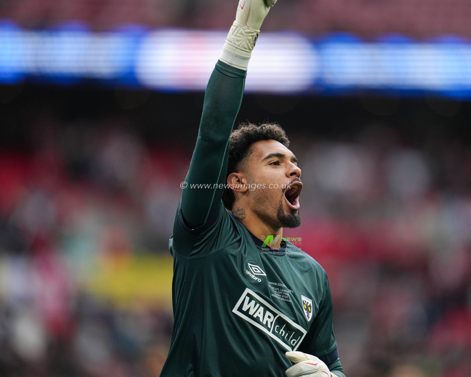 Owen Goodman of AFC Wimbledon celebrating win during the Sky Bet League 2 Playoff Final match AFC Wimbledon vs Walsall at Wembley Stadium, London, United Kingdom, 26th May 2025

(Photo by Harvey Murphy/News Images)