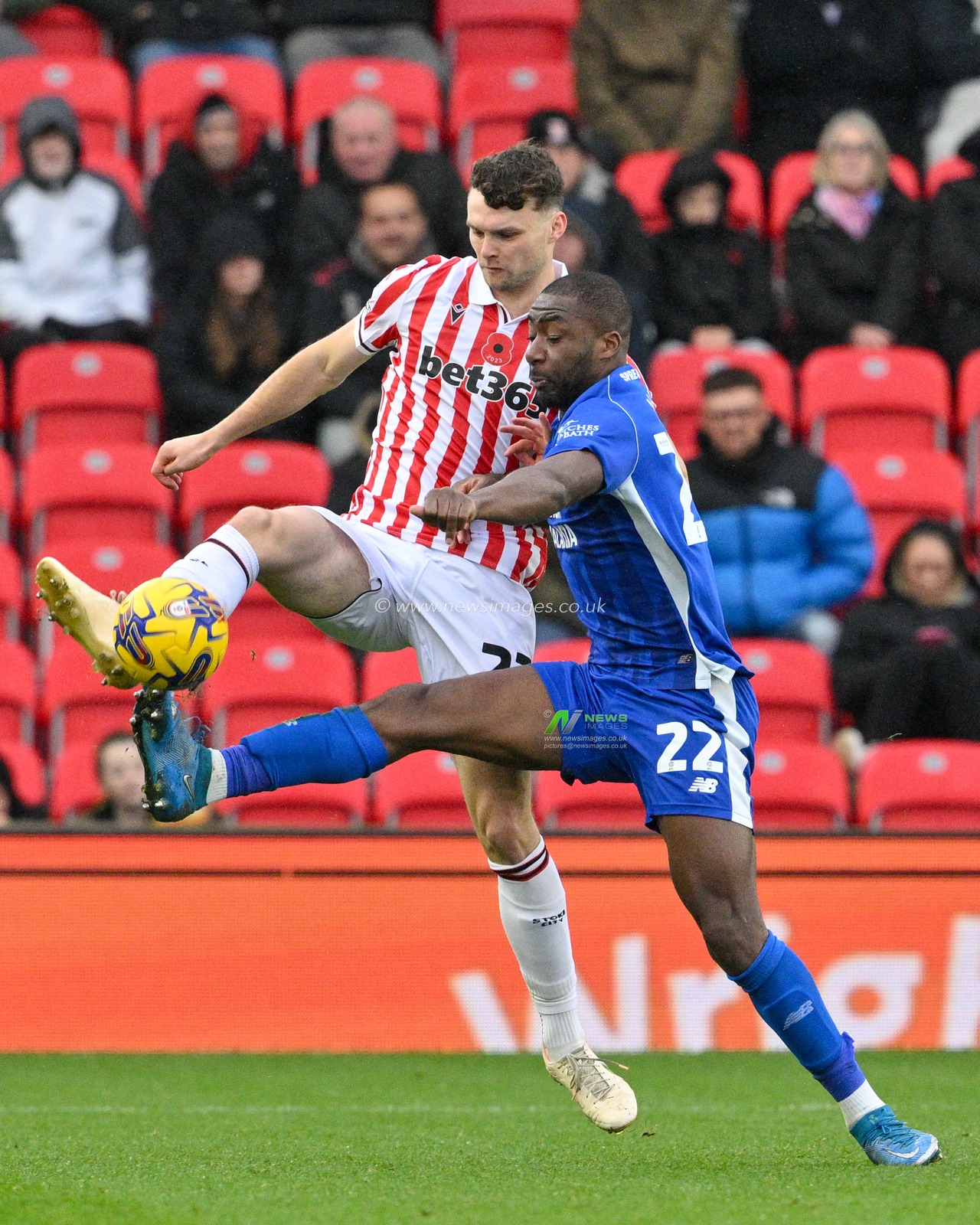 Luke McNally 23# of Stoke City Football Club and Yakou MÃ©Ã¯te 22# of Cardiff City Association Football Club battle for the ball, during the Sky Bet Championship match Stoke City vs Cardiff City at Bet365 Stadium, Stoke-on-Trent, United Kingdom, 4th November 2023

(Photo by Cody Froggatt/News Images)