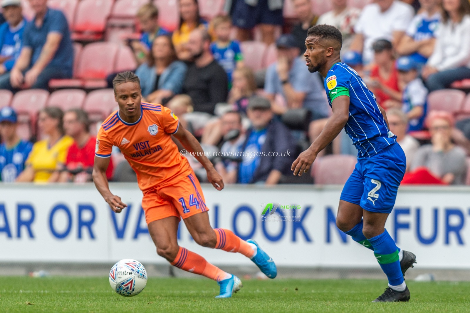 3rd August 2019, DW Stadium, Wigan, England; Sky Bet Championship, Wigan Athletic vs Cardiff City ; Nathan Byrne (2) of Wigan Athletic releases the ball before the tackle from Bobby Reid (14) of Cardiff City 


Credit: Richard Long/News Images

English Football League images are subject to DataCo Licence