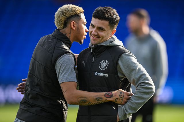 Albie Morgan of Blackpool greets Jordan Lawrence-Gabriel of Blackpool as he arrives ahead of the Sky Bet League 1 match Stockport County vs Blackpool at Edgeley Park Stadium, Stockport, United Kingdom, 1st March 2025

(Photo by Craig Thomas/News Images)