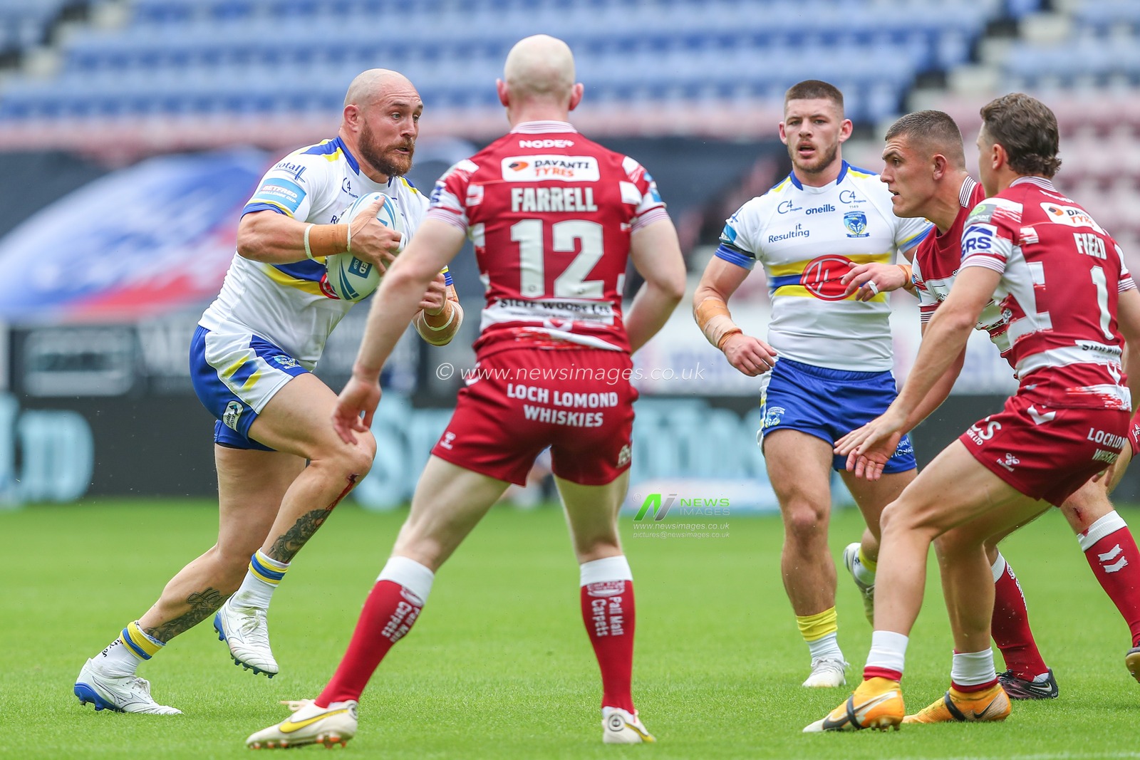Gil Dudson #17 of Warrington Wolves in action during the Betfred Challenge Cup Quarter-Final match Wigan Warriors vs Warrington Wolves at DW Stadium, Wigan, United Kingdom, 18th June 2023

(Photo by Gareth Evans/News Images)