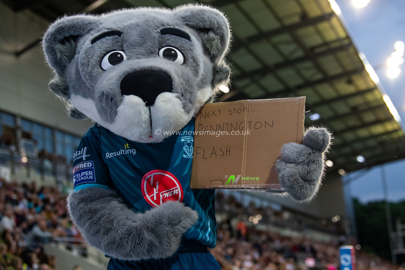 Wolfie with a sign during the Betfred Super League Round 13 match Leigh Leopards vs Warrington Wolves at Leigh Sports Village, Leigh, United Kingdom, 26th May 2023

(Photo by Craig Thomas/News Images)