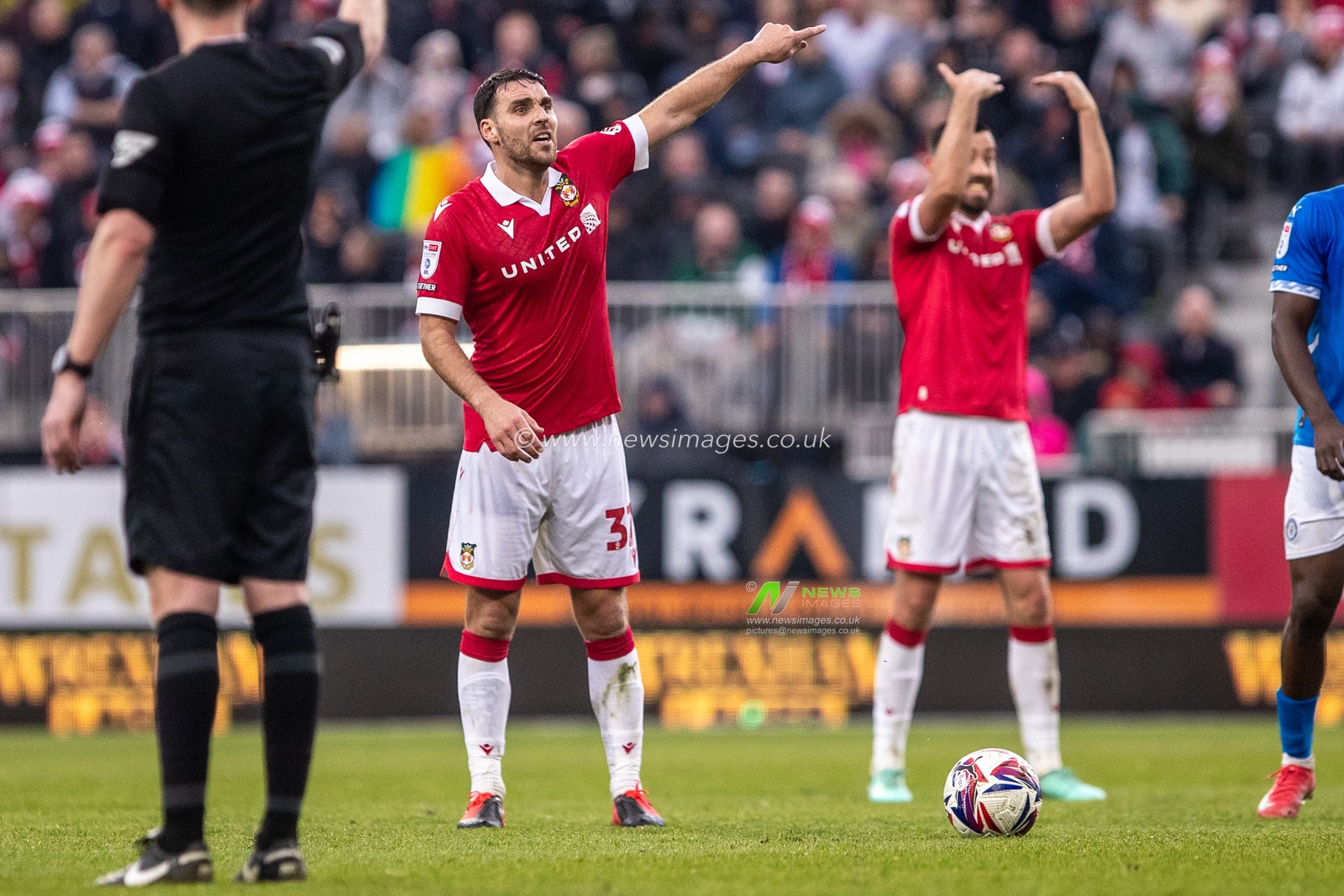 Wrexham's Matty James gives direction during the Sky Bet League 1 match Wrexham vs Stockport County at SToK Cae Ras, Wrexham, United Kingdom, 22nd March 2025

(Photo by Nik Mesney/News Images)