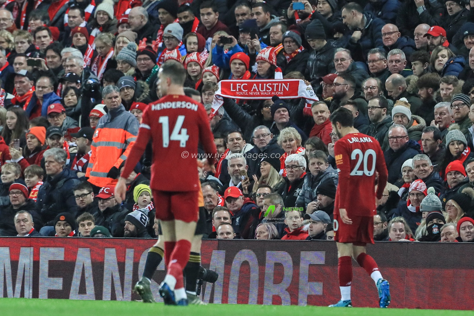 29th December 2019, Anfield, Liverpool, England; Premier League, Liverpool v Wolverhampton Wanderers : Liverpool fan holds a scarf saying â€˜LFC AUSTINâ€™

Credit: Mark Cosgrove/News Images