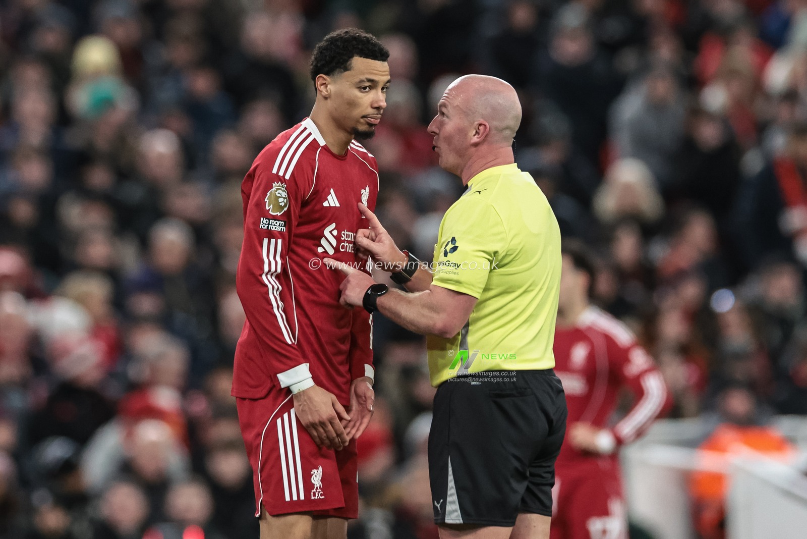 Referee Simon Hooper speaks to Hugo Ekitike of Liverpool during the Premier League match Liverpool vs Wolverhampton Wanderers at Anfield, Liverpool, United Kingdom, 27th December 2025

(Photo by Mark Cosgrove/News Images)

*** GER AUT SUI OUT ***