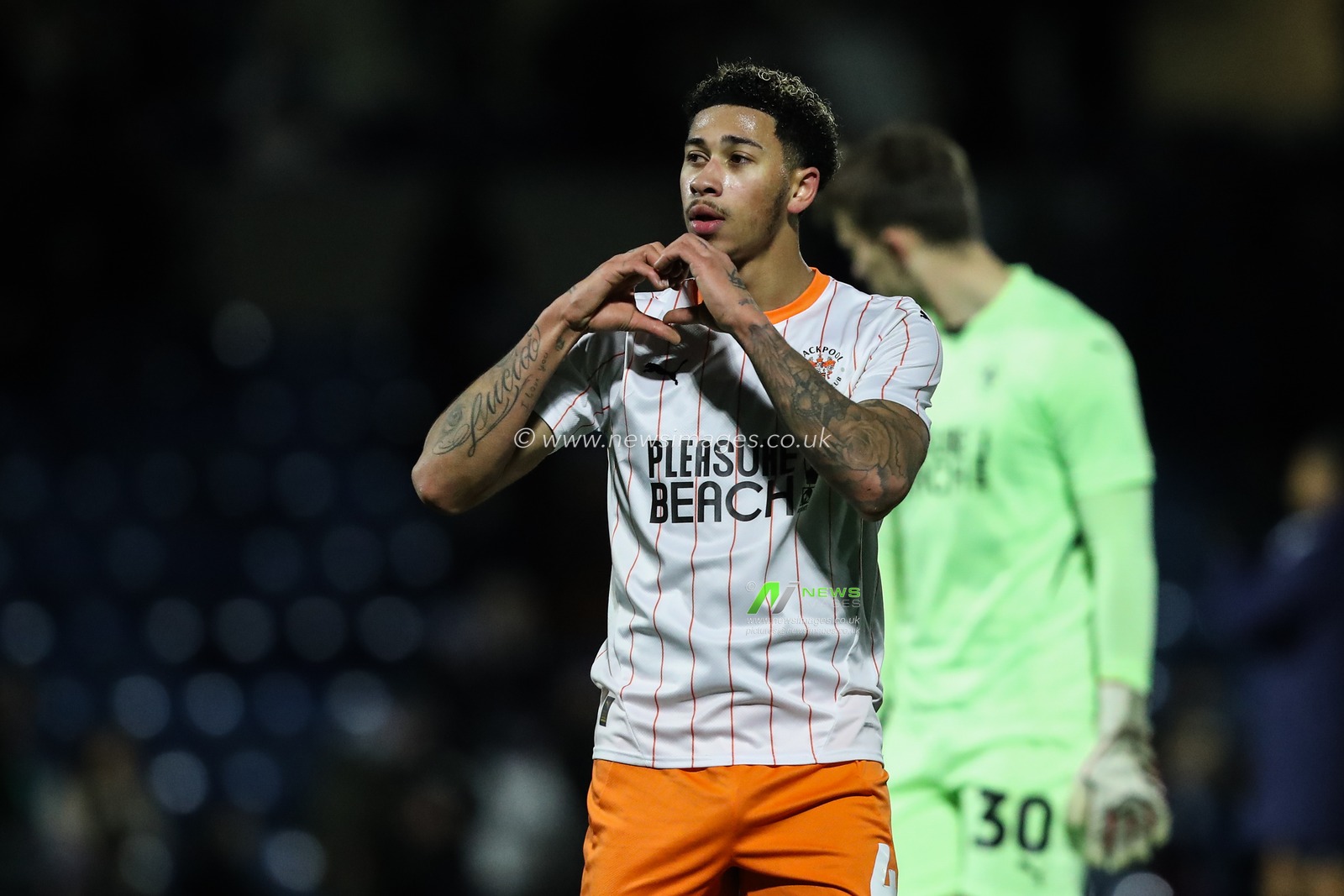 Jordan Lawrence-Gabriel of Blackpool gestures to the travelling fans after the Sky Bet League 1 match Wycombe Wanderers vs Blackpool at Adams Park, High Wycombe, United Kingdom, 4th January 2025

(Photo by Gareth Evans/News Images)