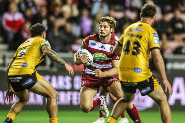Ethan Havard of Wigan Warriors is tackled by Liam Horne of Castleford Tigers during the Betfred Super League Round 26 match Wigan Warriors vs Castleford Tigers at The Brick Community Stadium, Wigan, United Kingdom, 12th September 2025

(Photo by Alfie Cosgrove/News Images)