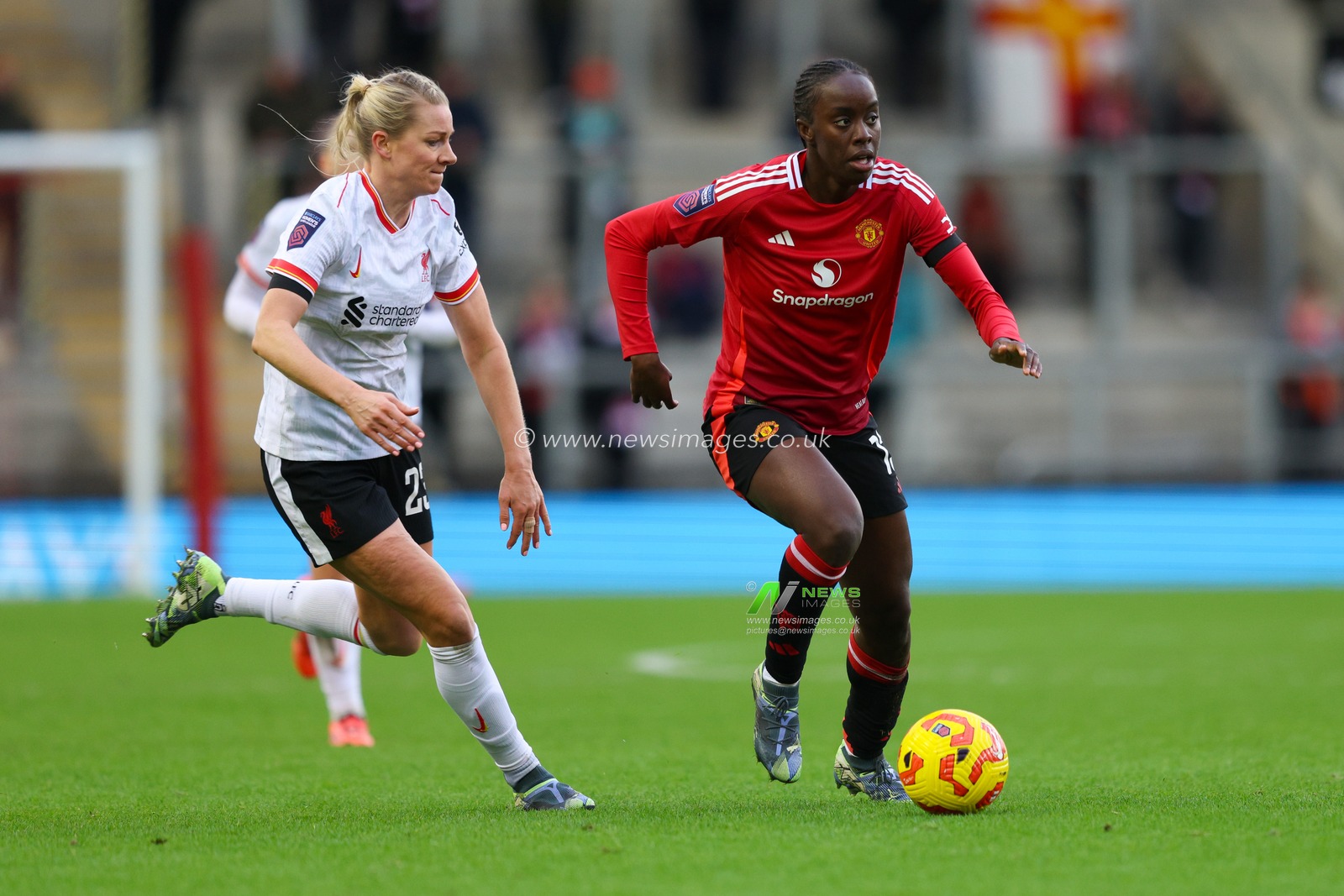Simi Awujo of Manchester United in action during the Barclays Women's Super League match Manchester United Women vs Liverpool Women at Leigh Sports Village, Leigh, United Kingdom, 8th December 2024

(Photo by Alex Roebuck/News Images)