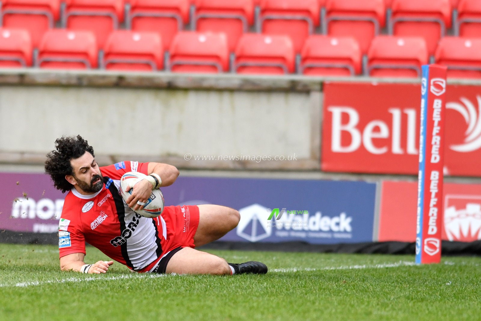 8th February 2020, AJ Bell Stadium, Eccles, England; Betfred Super League, Salford Red Devils v Toronto Wolfpack : Rhys Williams (22) of Salford Red Devils goes over for a try