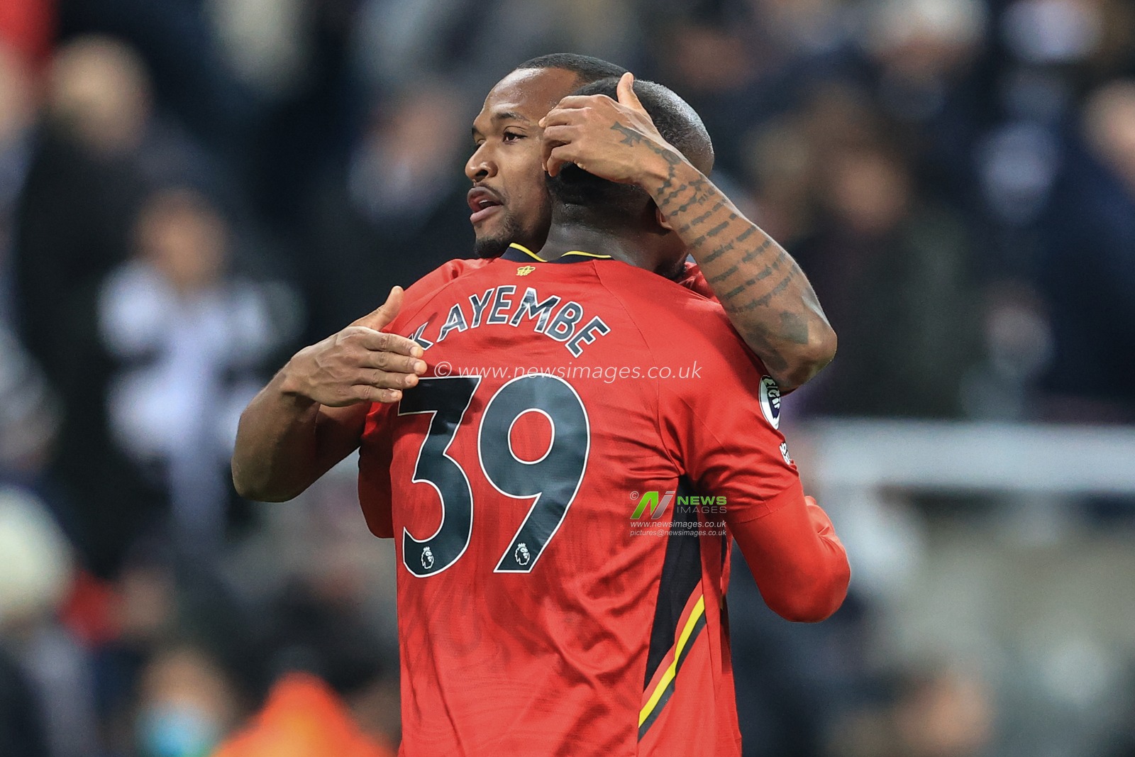 Edo Kayembe #39 of Watford and Samir #22 of Watford celebrate after the final whistle as Watford get a draw late in the game