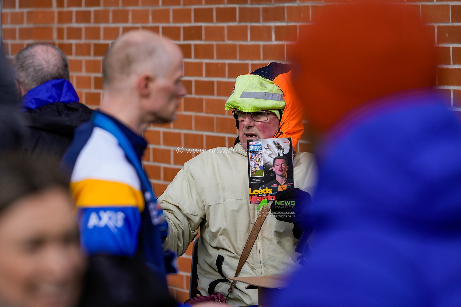 A vendor sells the match day program during the Betfred Super League round 1 match Leeds Rhinos vs Warrington Wolves at AMT Headingley Stadium, Leeds, United Kingdom on 29 March 2026

(Photo by Maynard Manyowa/News Images)