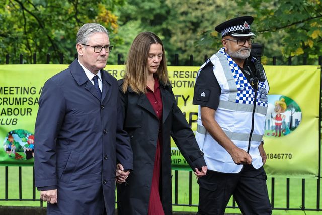 Sir Keir Starmer, Prime Minister of the United Kingdom of Great Britain and Northern Ireland and his wife Victoria, Lady Starmer attend the scene as they pay their respects during the Manchester synagogue terror attack day 2 at Heaton Park Shul, Manchester, United Kingdom, 3rd October 2025

(Photo by Mark Cosgrove/News Images)