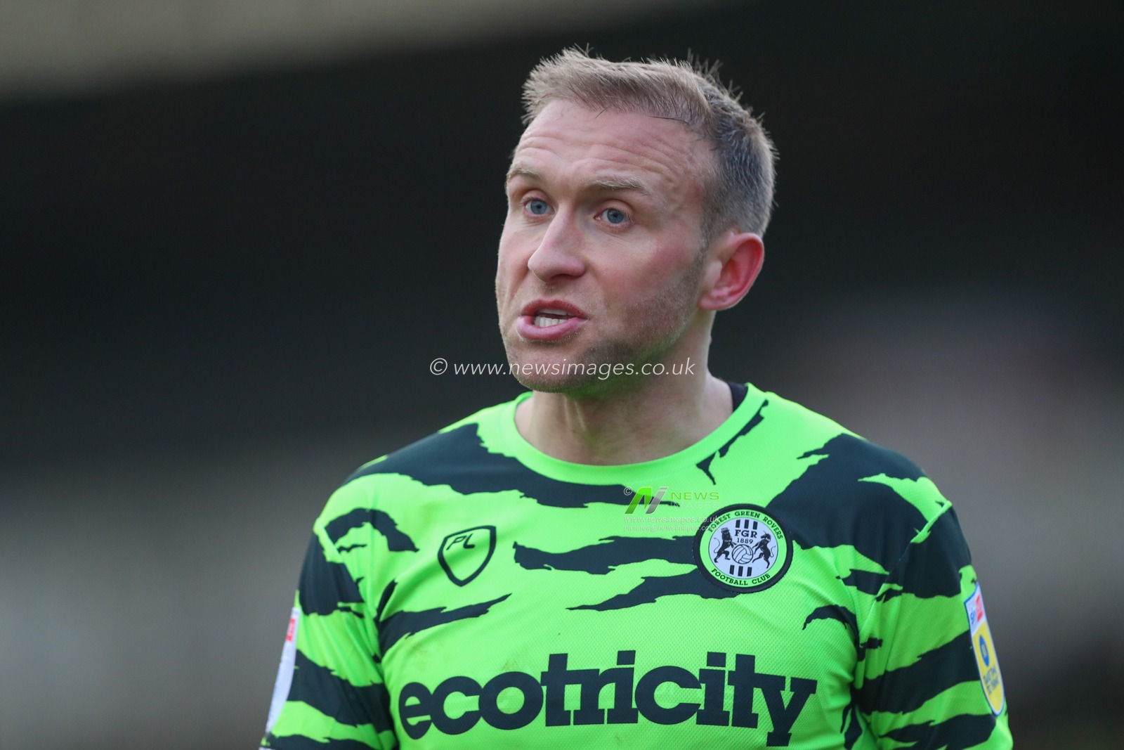 Dylan McGeouch #4 of Forest Green Rovers talks to the linesman during the Sky Bet League 1 match Forest Green Rovers vs Cambridge United at The New Lawn, Nailsworth, United Kingdom, 3rd December 2022

(Photo by Gareth Evans/News Images)