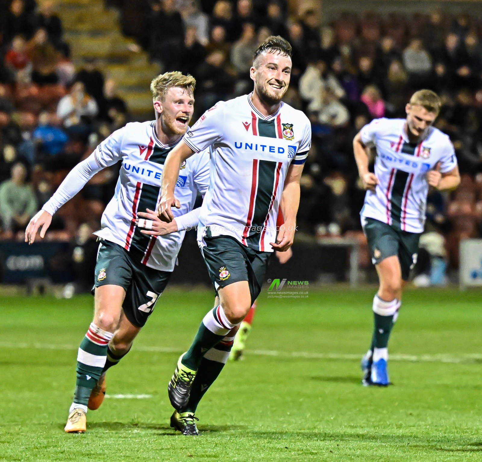 Luke Young 8# of Wrexham Association Football Club celebrates scoring Wrexhamâ€™s penalty, during the EFL Trophy match Crewe Alexandra vs Wrexham at Alexandra Stadium, Crewe, United Kingdom, 10th October 2023

(Photo by Cody Froggatt/News Images)