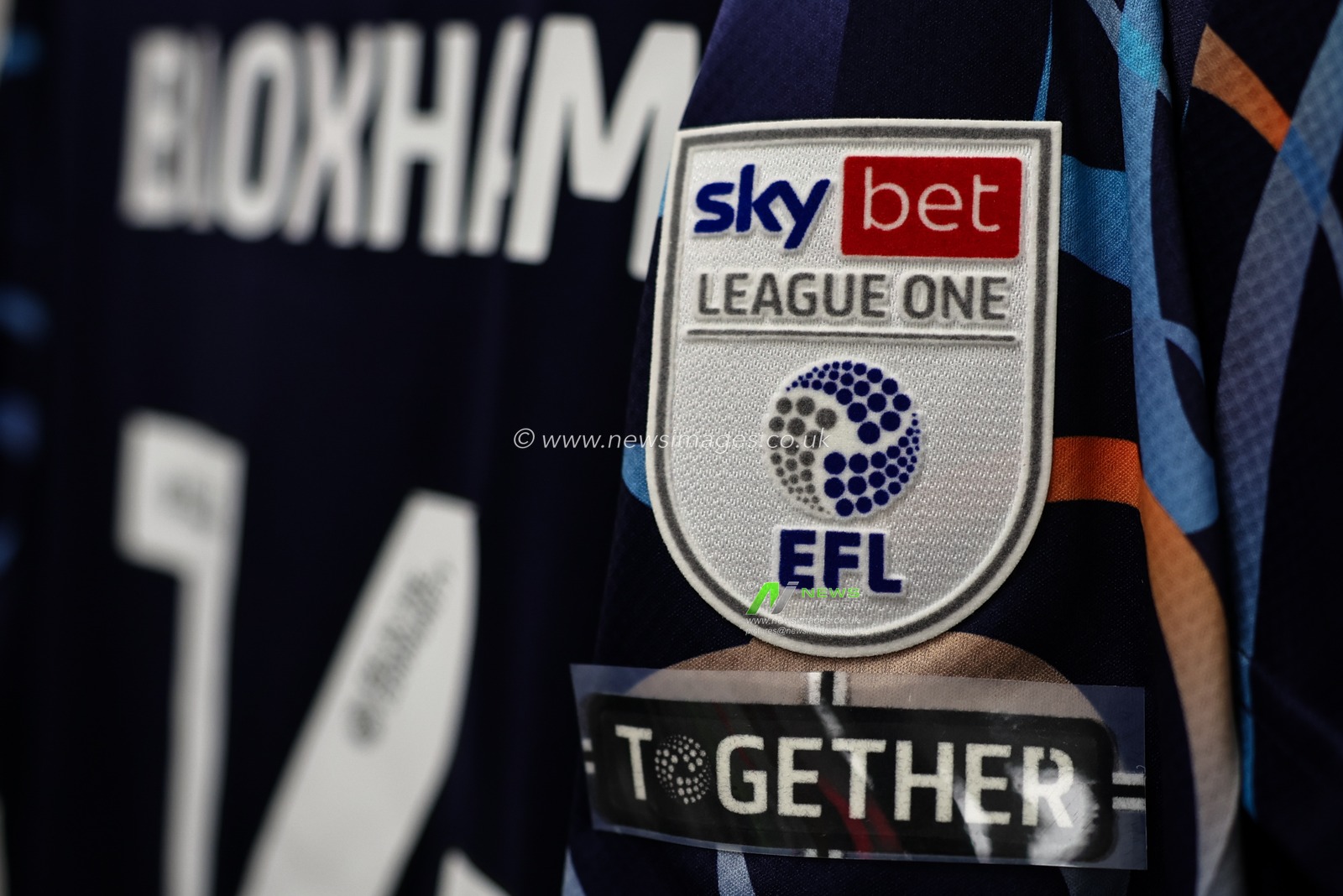 Sky Bet League One badge of Tom Bloxham of Blackpool during the Sky Bet League 1 match Lincoln City vs Blackpool at Gelder Group Sincil Bank Stadium, Lincoln, United Kingdom, 28th January 2025

(Photo by Mark Cosgrove/News Images)