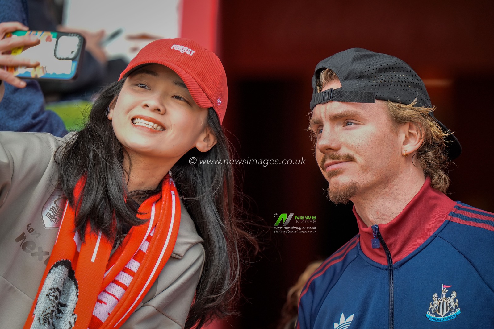 Nick Woltemade of Newcastle United takes an image with a fan during the Premier League match Nottingham Forest vs Newcastle Untied at City Ground, Nottingham, United Kingdom on 10 May 2026

(Photo by Maynard Manyowa/News Images)