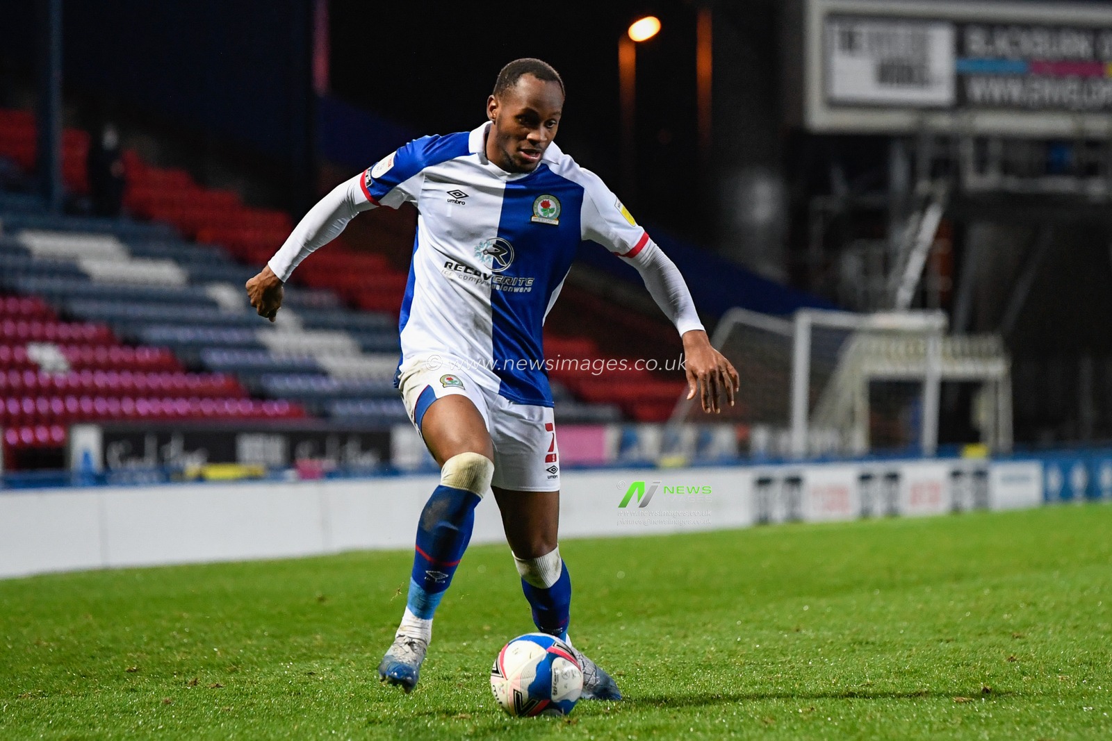 Ryan Nyambe #2 of Blackburn Rovers with the ball