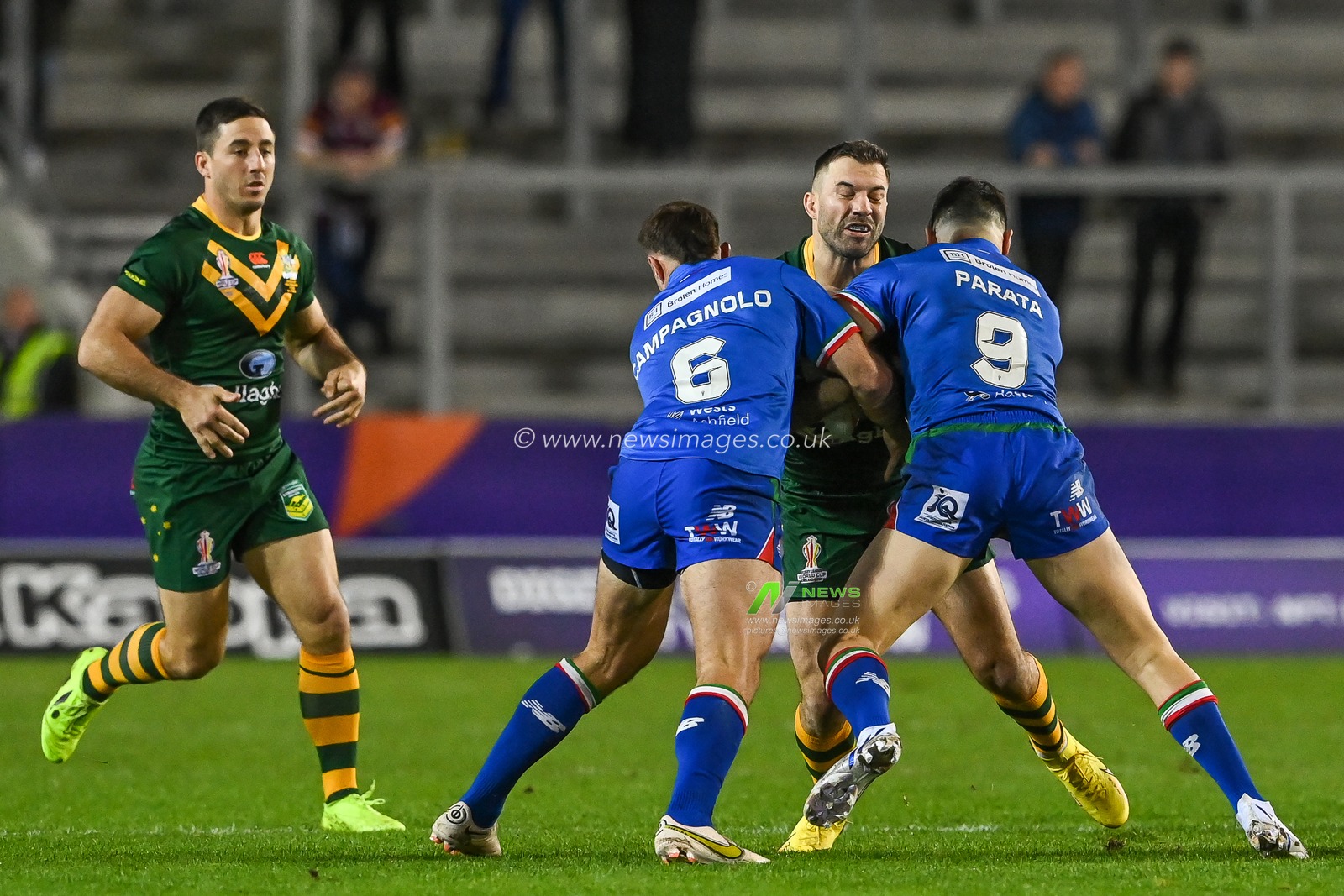 James Tedesco of Australia is tackled by Jack Campagnolo and Dean Parata of Italy during the Rugby League World Cup 2021 match Australia vs Italy at Totally Wicked Stadium, St Helens, United Kingdom, 29th October 2022

(Photo by Craig Thomas/News Images)
