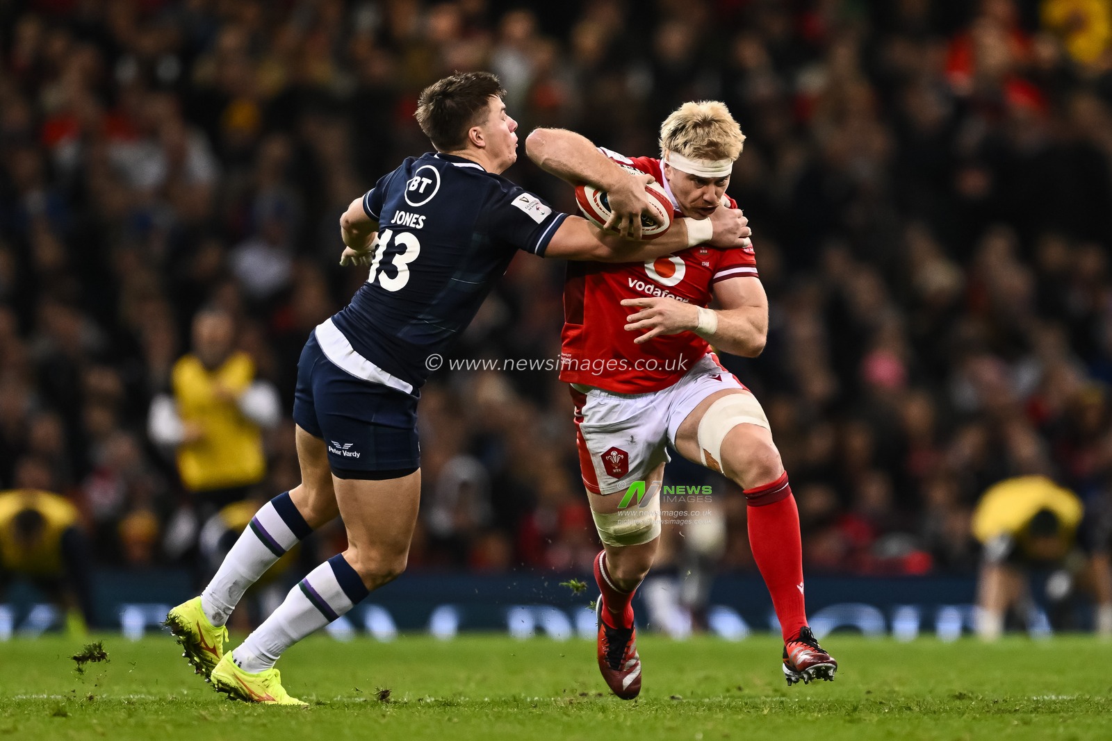 Aaron Wainwright of Wales is tackled by Huw Jones of Scotland during the 2024 Guinness 6 Nations match Wales vs Scotland at Principality Stadium, Cardiff, United Kingdom, 3rd February 2024

(Photo by Craig Thomas/News Images)